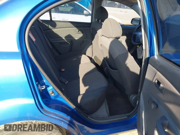 2008 Kia Rio LX with VIN KNADE123X86356526, listed as a IAAI auction lot 41649783 with 201,934 mi miles. Bid and sale history available at carsss.com. Image 8.