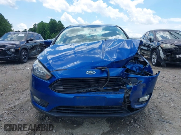 2018 Ford Focus SE with VIN 1FADP3FE8JL238024, listed as a IAAI auction lot 42463643 with Not provided miles and . Bid and sale history available at DreamBid. Image 12.