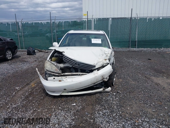 2005 Toyota Camry LE with VIN JTDBF30KX50165586, listed as a IAAI auction lot 41948322 with 84,326 mi miles and . Bid and sale history available at DreamBid. Image 12.