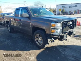 2014 Chevrolet Silverado 1500 LT with VIN 1GCVKREC9EZ300548, listed as a IAAI auction lot 41318981 with 237,113 mi miles and . Bid and sale history available at DreamBid. Image 1.