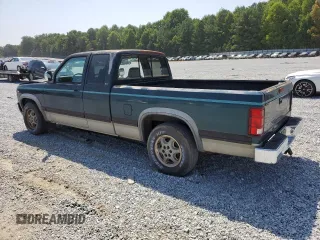 1995 Dodge Dakota with VIN 1B7GL23Y9SS177365, listed as a Copart auction lot 68956734 with 210,499 mi miles and Salvage Title. Bid and sale history available at carsss.com. Image 2.