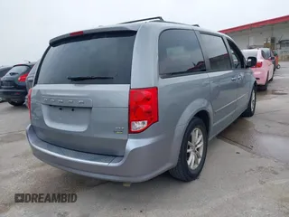 2014 Dodge Grand Caravan SXT z VIN 2C4RDGCG7ER212419, wystawiony jako IAAI lot #42272015 z przebiegiem 175 801 mil mil oraz . Historia ofert i sprzedaży dostępna na DreamBid. Obrazek 4.