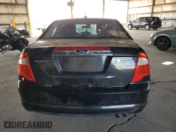 2012 Ford Fusion Hybrid с VIN 3FADP0L34CR416775, выставлен на аукционе Copart как лот 55108645 с пробегом 102 574 миль миль и Списание • Salvage title. История ставок и продаж доступна на DreamBid. Изображение 6.