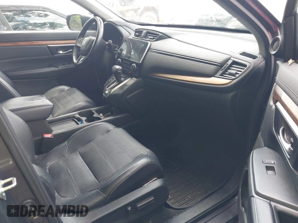 2018 Honda CR-V Touring z VIN 7FARW1H9XJE040530, wystawiony jako IAAI lot #42227446 z przebiegiem 101 299 mil mil oraz . Historia ofert i sprzedaży dostępna na DreamBid. Obrazek 5.