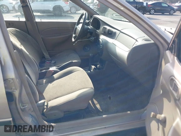 1999 Ford Escort LX with VIN 1FAFP10P3XW138847, listed as a IAAI auction lot 41216936 with 62,672 mi miles and . Bid and sale history available at DreamBid. Image 5.