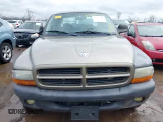 2002 Dodge Dakota SLT z VIN 1B7HG48N32S634478, wystawiony jako IAAI lot #41485500 z przebiegiem 166 082 mil mil oraz . Historia ofert i sprzedaży dostępna na DreamBid. Obrazek 6.