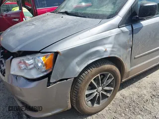 2015 Dodge Grand Caravan American Value with VIN 2C4RDGBG6FR576897, listed as a IAAI auction lot 41780897 with 159,823 mi miles and . Bid and sale history available at DreamBid. Image 6.