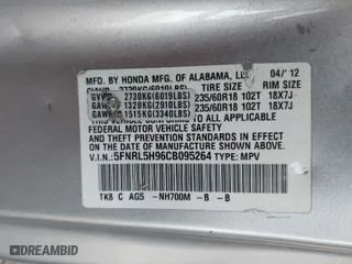 2012 Honda Odyssey Touring with VIN 5FNRL5H96CB095264, listed as a IAAI auction lot 41403450 with 246,199 mi miles. Bid and sale history available at carsss.com. Image 9.