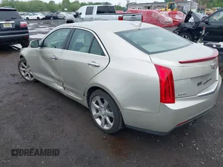 2015 Cadillac ATS Luxury RWD z VIN 1G6AB5RX8F0101942, wystawiony jako IAAI lot #42199906 z przebiegiem 58 627 mil mil oraz . Historia ofert i sprzedaży dostępna na DreamBid. Obrazek 3.