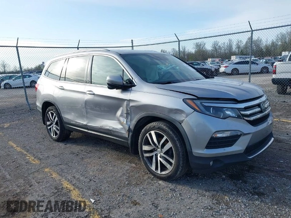 2016 Honda Pilot Touring with VIN 5FNYF6H90GB024902, listed as a IAAI auction lot 41948563 with 148,598 mi miles. Bid and sale history available at carsss.com. Image 1.