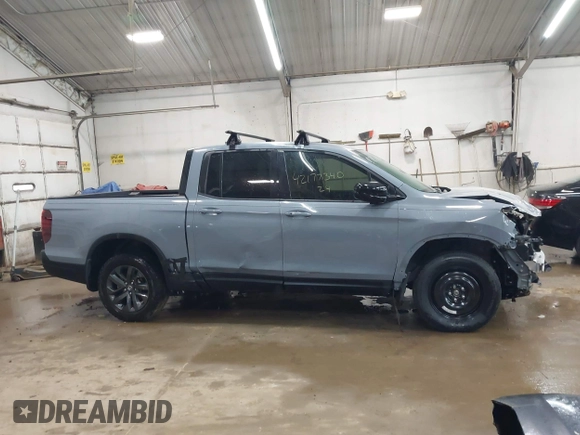 2024 Honda Ridgeline Sport z VIN 5FPYK3F16RB015283, wystawiony jako IAAI lot #42177340 z przebiegiem 7 581 mil mil oraz . Historia ofert i sprzedaży dostępna na DreamBid. Obrazek 13.