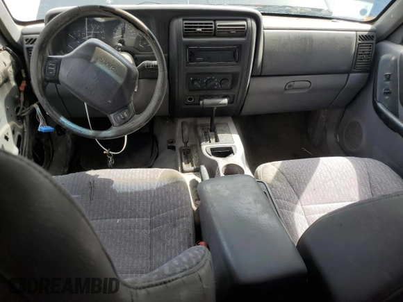 1998 Jeep Cherokee Sport with VIN 1J4FJ68S8WL219208, listed as a Copart auction lot 54593865 with 0 mi miles and Clean Title. Bid and sale history available at carsss.com. Image 8.