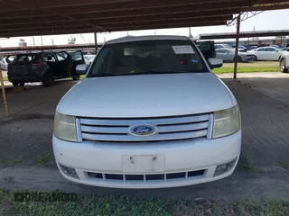 2008 Ford Taurus SEL z VIN 1FAHP24W68G143505, wystawiony jako IAAI lot #41932592 z przebiegiem 238 542 mil mil oraz . Historia ofert i sprzedaży dostępna na DreamBid. Obrazek 6.