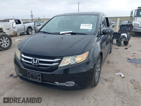2014 Honda Odyssey Touring with VIN 5FNRL5H9XEB045695, listed as a IAAI auction lot 41545348 with 131,472 mi miles and . Bid and sale history available at carsss.com. Image 17.