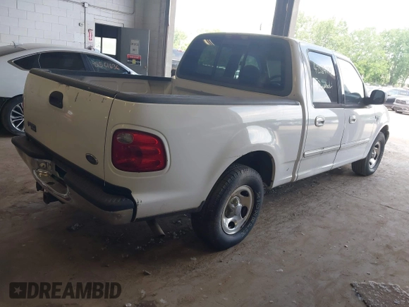 2001 Ford F-150 XLT with VIN 1FTRW07LX1KD77186, listed as a IAAI auction lot 42564774 with 190,647 mi miles and . Bid and sale history available at DreamBid. Image 4.