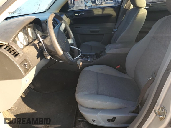 2005 Chrysler 300 with VIN 2C3JA43R65H528703, listed as a Copart auction lot 42057285 with 159,316 mi miles and Salvage Title. Bid and sale history available at carsss.com. Image 7.