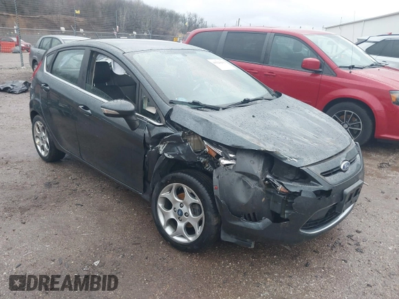 2011 Ford Fiesta SES with VIN 3FADP4FJ7BM111381, listed as a IAAI auction lot 41226251 with 93,694 mi miles. Bid and sale history available at carsss.com. Image 1.