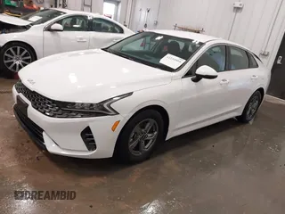 2023 Kia K5 LXS z VIN 5XXG14J2XPG189462, wystawiony jako IAAI lot #42233595 z przebiegiem 17 286 mil mil oraz . Historia ofert i sprzedaży dostępna na DreamBid. Obrazek 18.