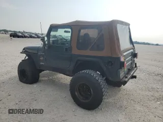 2002 Jeep Wrangler Sahara with VIN 1J4FA59S02P729015, listed as a Copart auction lot 63525745 with Not provided miles and Clean title. Bid and sale history available at DreamBid. Image 2.
