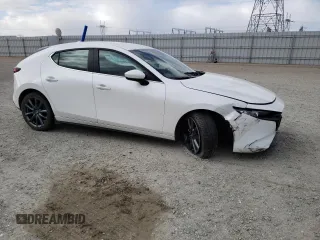 2019 Mazda Mazda3 Hatchback w/Preferred Pkg with VIN JM1BPAMM8K1135019, listed as a Copart auction lot 42312553 with 59,721 mi miles. Bid and sale history available at carsss.com. Image 4.
