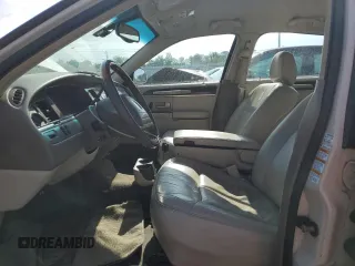2003 Lincoln Town Car Cartier z VIN 1LNHM83W33Y690270, wystawiony jako Copart lot #51682235 z przebiegiem 118 355 mil mil oraz Szkoda całkowita • Salvage title. Historia ofert i sprzedaży dostępna na DreamBid. Obrazek 7.