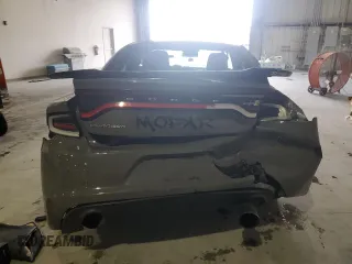 2017 Dodge Charger SE with VIN 2C3CDXBG8HH517322, listed as a Copart auction lot 55077165 with 118,180 mi miles and Clean Title. Bid and sale history available at carsss.com. Image 6.