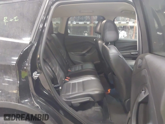 2017 Ford Escape Titanium with VIN 1FMCU9J9XHUB51401, listed as a IAAI auction lot 41025642 with 77,908 mi miles. Bid and sale history available at carsss.com. Image 8.