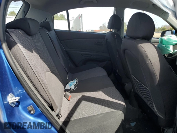 2009 Kia Rio LX with VIN KNADE243296500963, listed as a Copart auction lot 51061595 with 76,596 mi miles and Salvage Title. Bid and sale history available at carsss.com. Image 10.