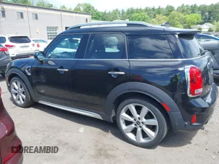 2017 MINI Countryman Cooper S z VIN WMZYT5C39H3D79798, wystawiony jako IAAI lot #42274782 z przebiegiem 96 669 mil mil oraz . Historia ofert i sprzedaży dostępna na DreamBid. Obrazek 15.