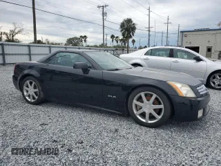 2005 Cadillac XLR z VIN 1G6YV34A855601131, wystawiony jako Copart lot #88100685 z przebiegiem 108 720 mil mil oraz Szkody całkowita. Historia ofert i sprzedaży dostępna na DreamBid. Obrazek 4.