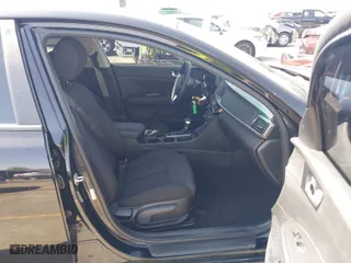 2018 Kia Optima S with VIN 5XXGT4L36JG221671, listed as a IAAI auction lot 41704040 with 136,815 mi miles. Bid and sale history available at carsss.com. Image 5.