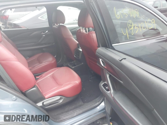 2022 Mazda CX-9 Grand Touring with VIN JM3TCBDY0N0615968, listed as a IAAI auction lot 42312159 with 22,912 mi miles and . Bid and sale history available at DreamBid. Image 8.