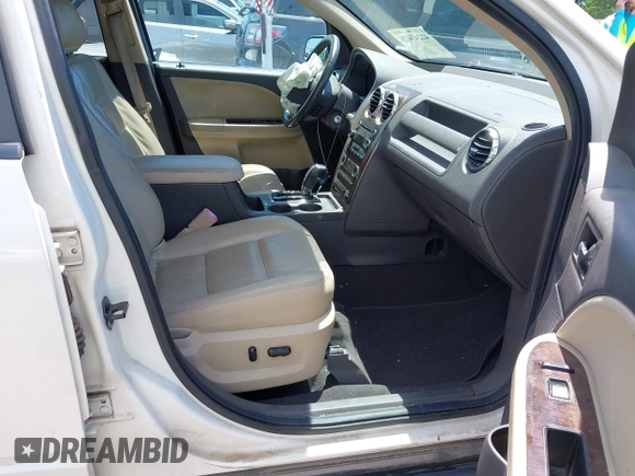 2009 Ford Taurus X Limited z VIN 1FMDK03W99GA03698, wystawiony jako IAAI lot #42243428 z przebiegiem 158 551 mil mil oraz . Historia ofert i sprzedaży dostępna na DreamBid. Obrazek 5.