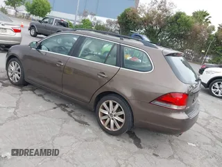 2012 Volkswagen Jetta SportWagen TDI with VIN 3VWPL7AJ1CM602054, listed as a IAAI auction lot 42138739 with 140,202 mi miles. Bid and sale history available at carsss.com. Image 3.