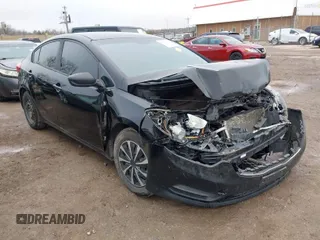 2016 Kia Forte LX with VIN KNAFK4A60G5606679, listed as a IAAI auction lot 41174978 with 96,754 mi miles. Bid and sale history available at carsss.com. Image 1.