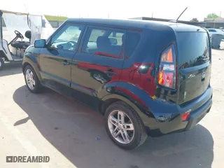 2011 Kia Soul + with VIN KNDJT2A27B7286270, listed as a IAAI auction lot 42063606 with 128,864 mi miles. Bid and sale history available at carsss.com. Image 3.