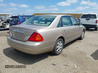 2001 Toyota Avalon XL w/Bucket Seats with VIN 4T1BF28B61U185881, listed as a IAAI auction lot 42138345 with 242,195 mi miles. Bid and sale history available at carsss.com. Image 4.