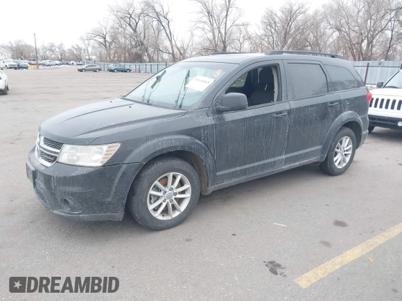2013 Dodge Journey SXT with VIN 3C4PDCBB2DT561182, listed as a IAAI auction lot 41616065 with 158,542 mi miles. Bid and sale history available at carsss.com. Image 2.
