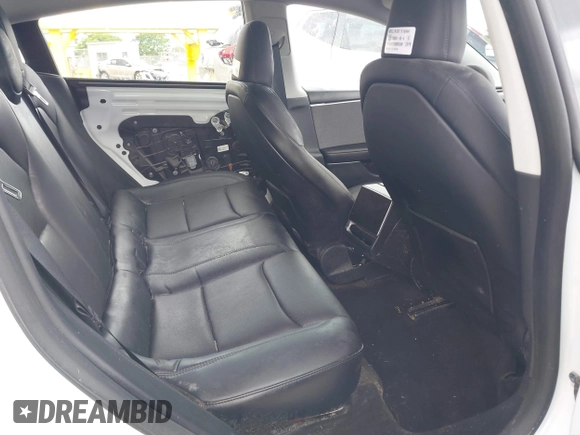 2024 Tesla Model 3 with VIN 5YJ3E1EA6RF751009, listed as a IAAI auction lot 40537919 with Not Provided miles and . Bid and sale history available at DreamBid. Image 8.