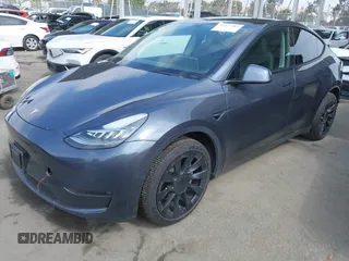 2022 Tesla Model Y Long Range z VIN 7SAYGDEE6NF364994, wystawiony jako IAAI lot #42322587 z przebiegiem 41 572 mil mil oraz . Historia ofert i sprzedaży dostępna na DreamBid. Obrazek 2.