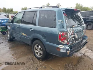 2007 Honda Pilot EX with VIN 2HKYF18437H528868, listed as a IAAI auction lot 41762030 with 203,212 mi miles. Bid and sale history available at carsss.com. Image 3.