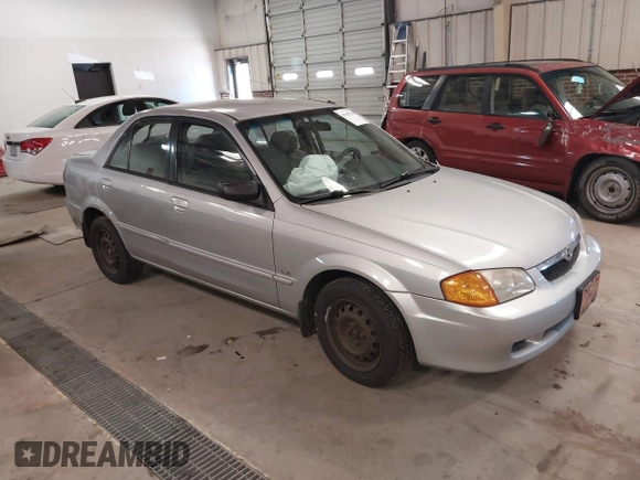 2000 Mazda Protege DX with VIN JM1BJ2226Y0206340, listed as a IAAI auction lot 41645396 with 238,500 mi miles and . Bid and sale history available at DreamBid. Image 1.