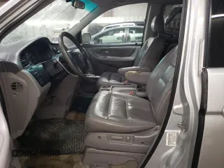 2004 Honda Odyssey EX-L with VIN 5FNRL189X4B098131, listed as a Copart auction lot 47294865 with 196,581 mi miles and Salvage Title. Bid and sale history available at DreamBid. Image 7.
