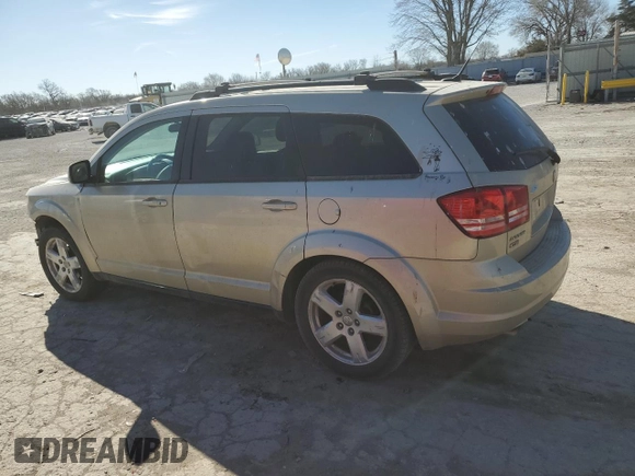 2010 Dodge Journey SXT with VIN 3D4PH5FV5AT169610, listed as a Copart auction lot 49323215 with 243,471 mi miles and Salvage Title. Bid and sale history available at carsss.com. Image 2.