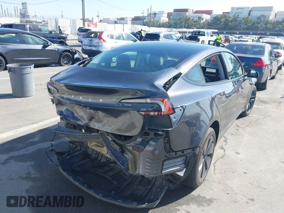 2024 Tesla Model 3 with VIN 5YJ3E1EA7RF717855, listed as a IAAI auction lot 41838814 with 8,750 mi miles and . Bid and sale history available at DreamBid. Image 6.