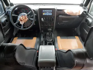 2008 Jeep Wrangler Unlimited X with VIN 1J4GA39188L653530, listed as a Copart auction lot 52585055 with 177,824 mi miles and Salvage Title. Bid and sale history available at carsss.com. Image 8.