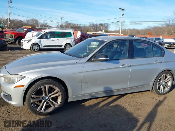 2013 BMW 3 Series 328i xDrive with VIN WBA3B3C56DF540744, listed as a IAAI auction lot 41433347 with 162,328 mi miles and . Bid and sale history available at DreamBid. Image 17.