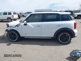 2016 MINI Countryman S with VIN WMWZC5C57GWU22015, listed as a IAAI auction lot 41806547 with 65,124 mi miles and . Bid and sale history available at DreamBid. Image 15.