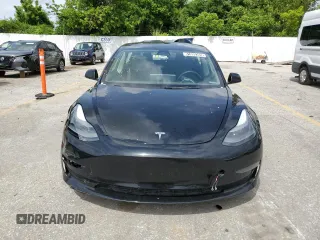 2023 Tesla Model 3 z VIN 5YJ3E1EA1PF438043, wystawiony jako Copart lot #61090305 z przebiegiem Nie podano mil oraz Nie do naprawy • Non repairable. Historia ofert i sprzedaży dostępna na DreamBid. Obrazek 5.