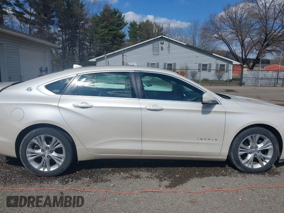 2014 Chevrolet Impala LT with VIN 1G1125S33EU101464, listed as a IAAI auction lot 41863521 with 215,270 mi miles and . Bid and sale history available at DreamBid. Image 14.